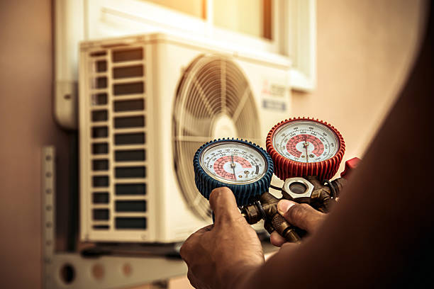 Professional Heat Pump Repair technician working in Flowery Branch, GA